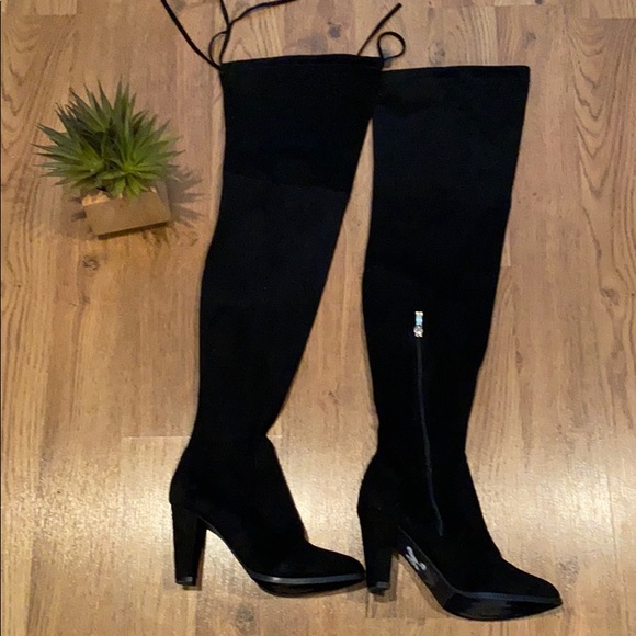 Over the knee heeled booties